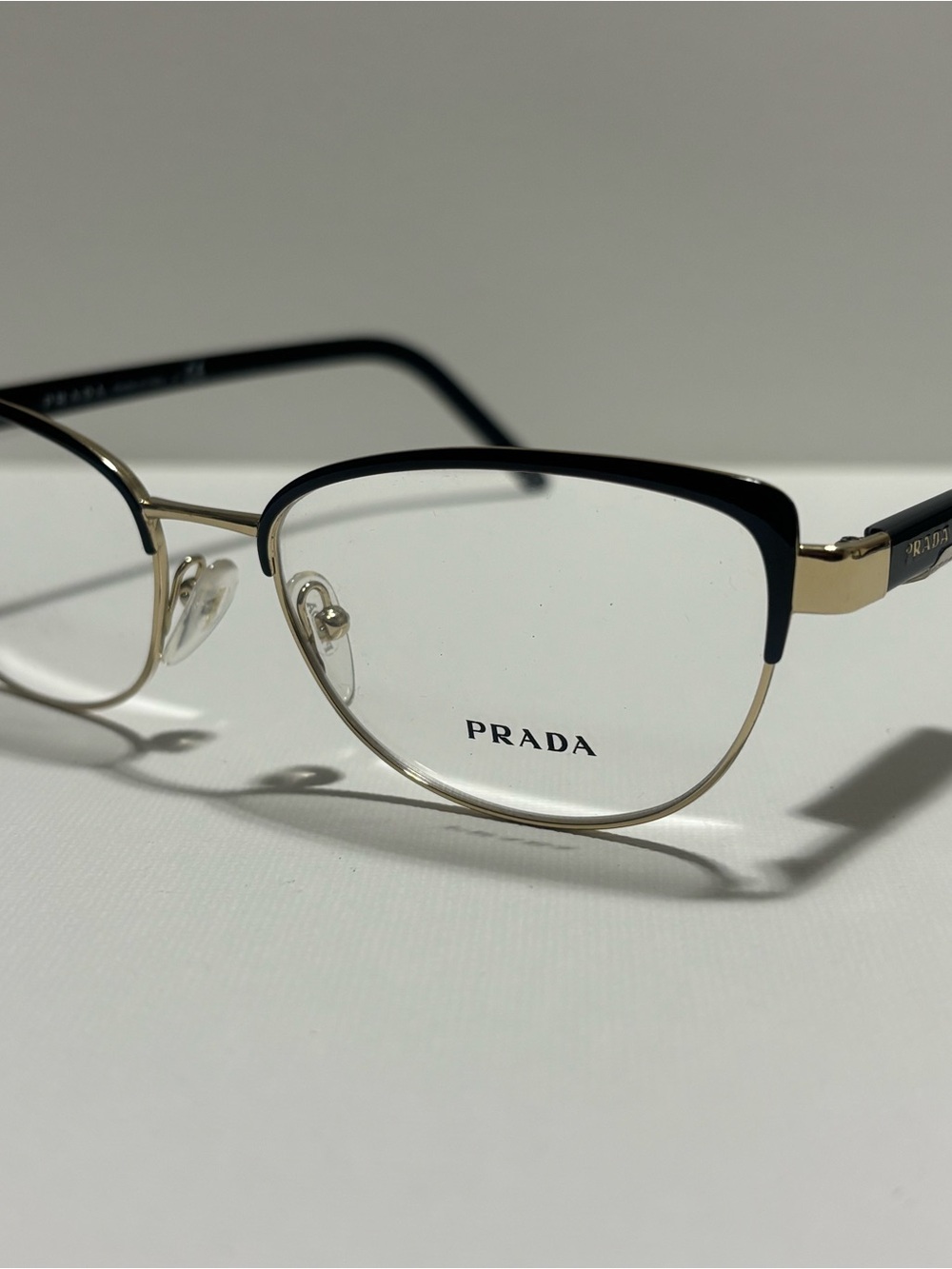 Prada Black and Gold Semi-Rim Cat-Eye Glasses